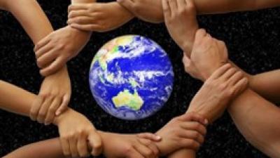 Hands around earth
