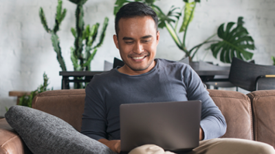 Man reading laptop